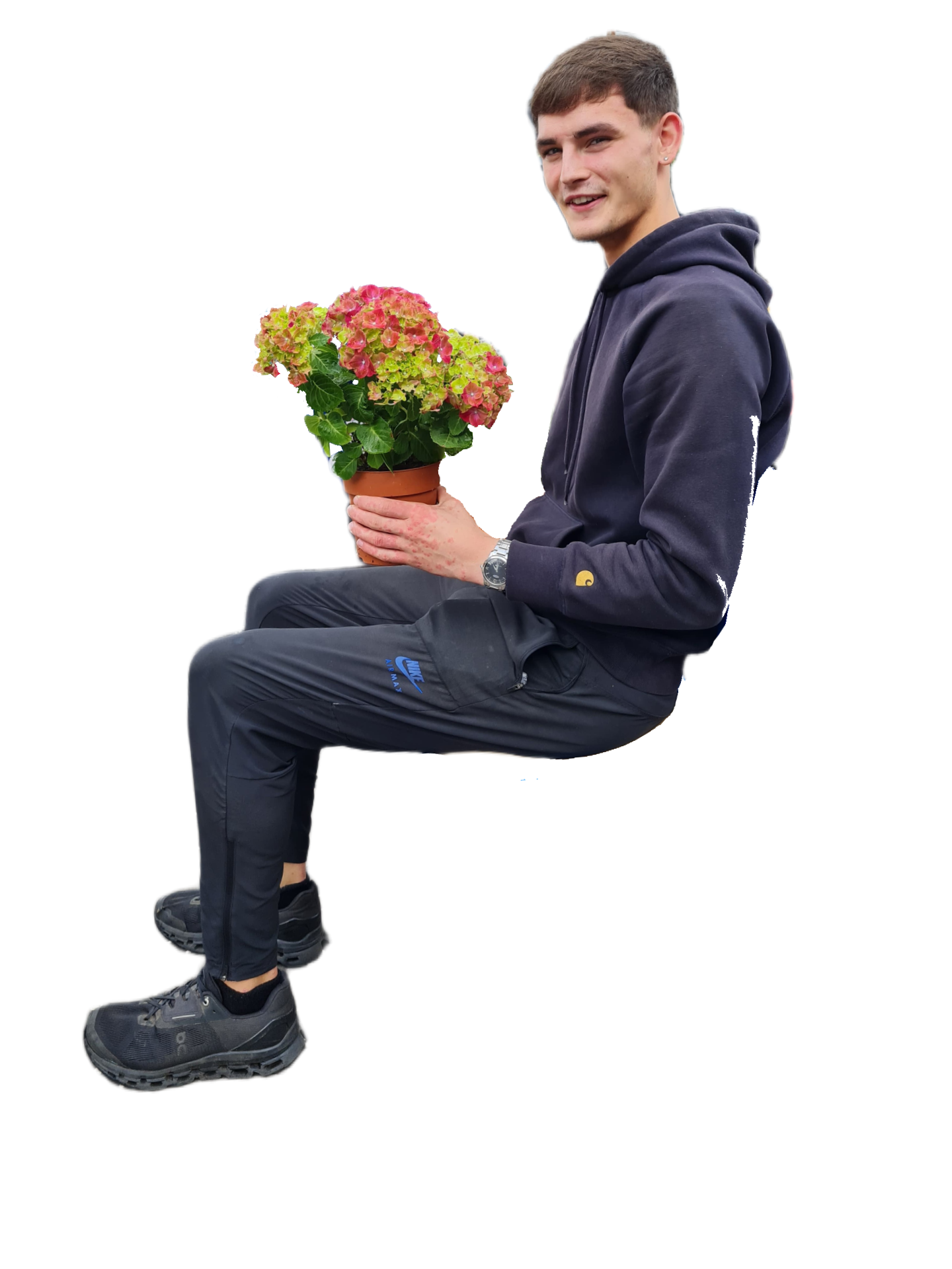 employee holding flowers